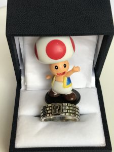 Toad posing with the ring
